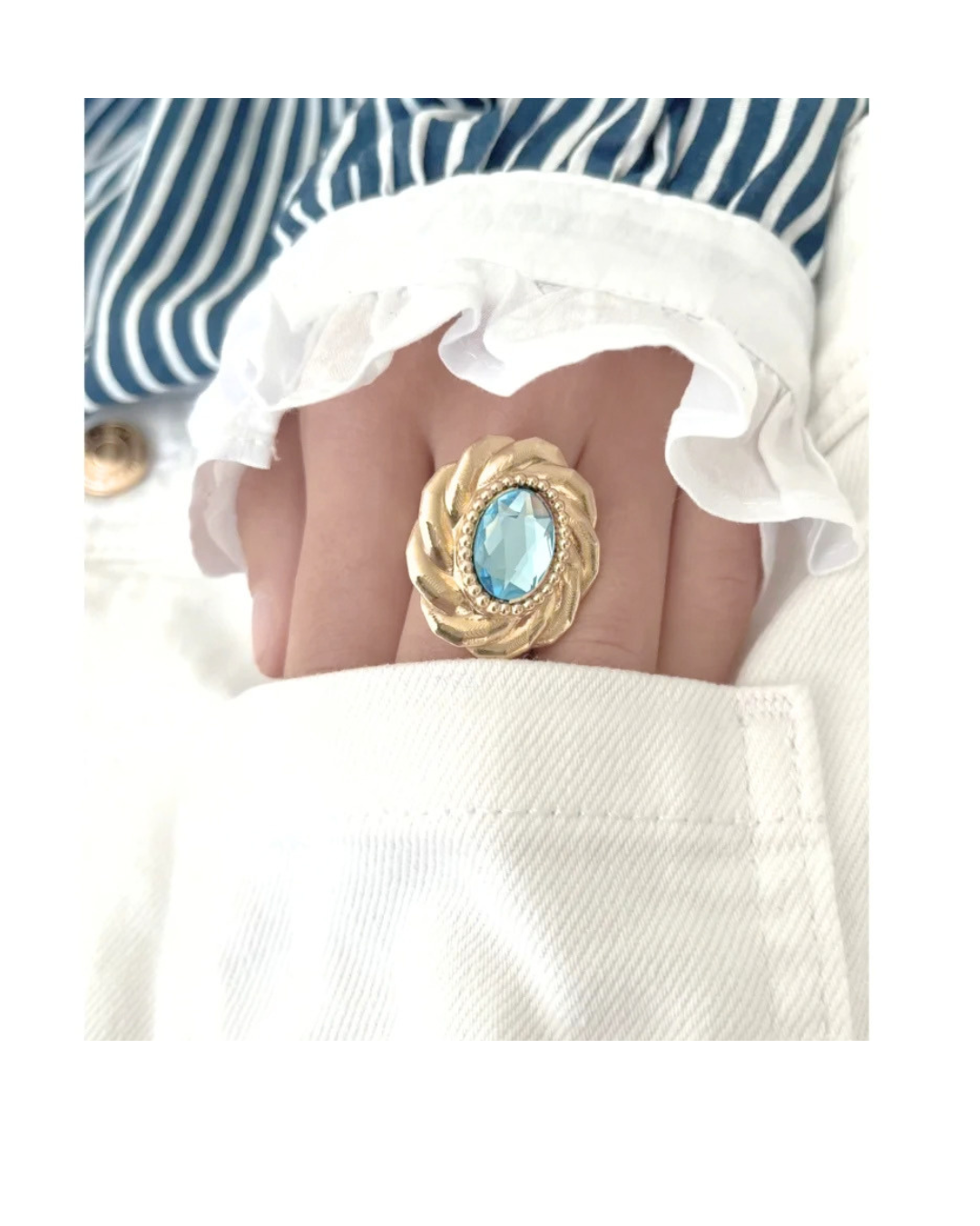 Bague femme dorée à l'or fin et sa perle lumineuse bleu lagon
