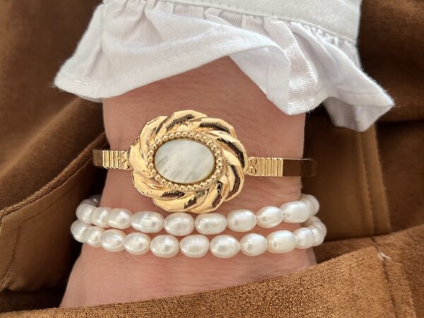 Bracelet design & sa perle lumineuse