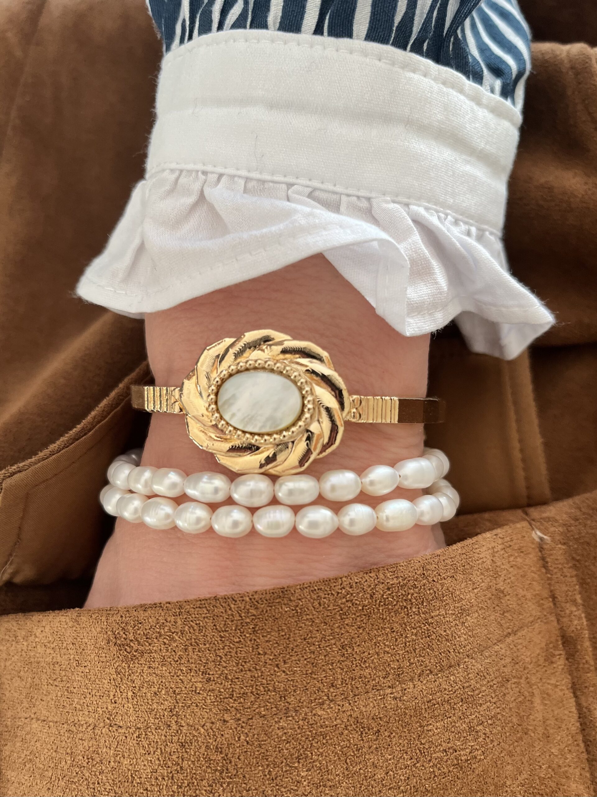 Bracelet design & sa perle lumineuse