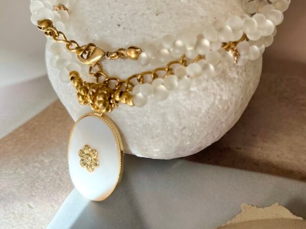 Collier femme doré & son pendentif floral